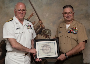 Captain Weaver (right) receiving award